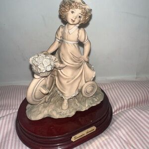 Giuseppe Armani Florence “ Girl on a Tricycle with a Basket of Flowers” Figurine